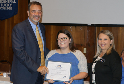 Glasgow Health Campus nursing student Kayla Miller (center) receives the Presidential Scholarship at this year’s Glasgow/Barren County Industry Appreciation breakfast held Friday, September 13, 2019 at the Barren Rivers State Lodge. Presenting the scholarship was SKYCTC President, Dr. Phil Neal (left) and Angie Harlan, Dean of Allied Health and Nursing (right). Also receiving the Presidential Scholarship was Mark White of Nemak Industries who could not be present at the breakfast.