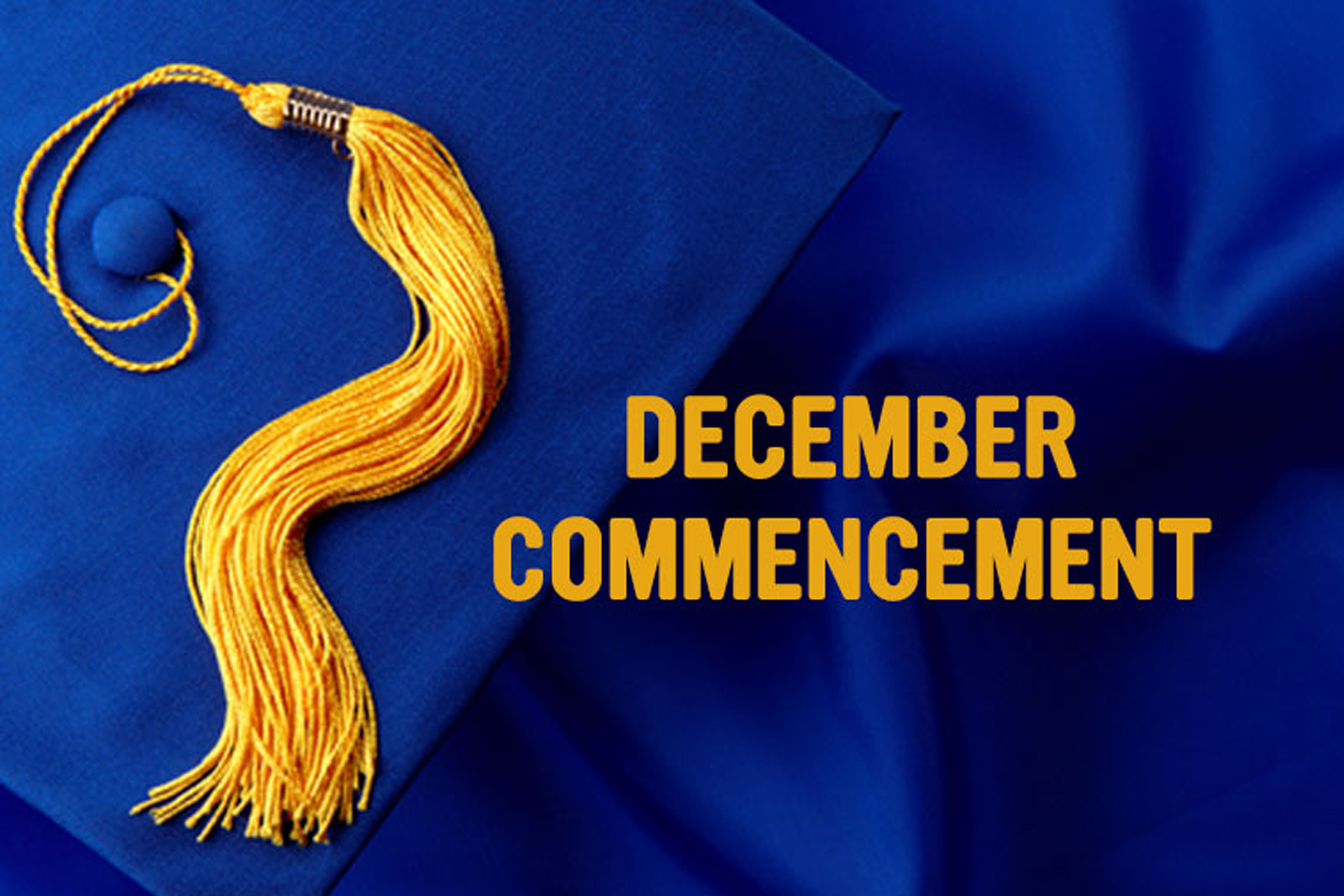 Cap and gown with words December Commencement