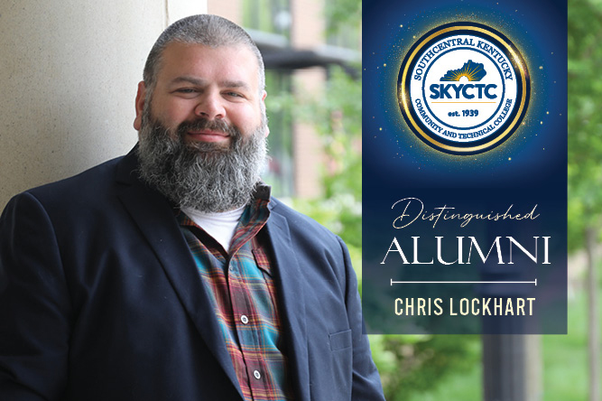 Chris Lockhart standing beside column on main campus