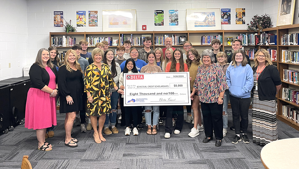 Large group of Butler County Dual Credit students with a check presentation