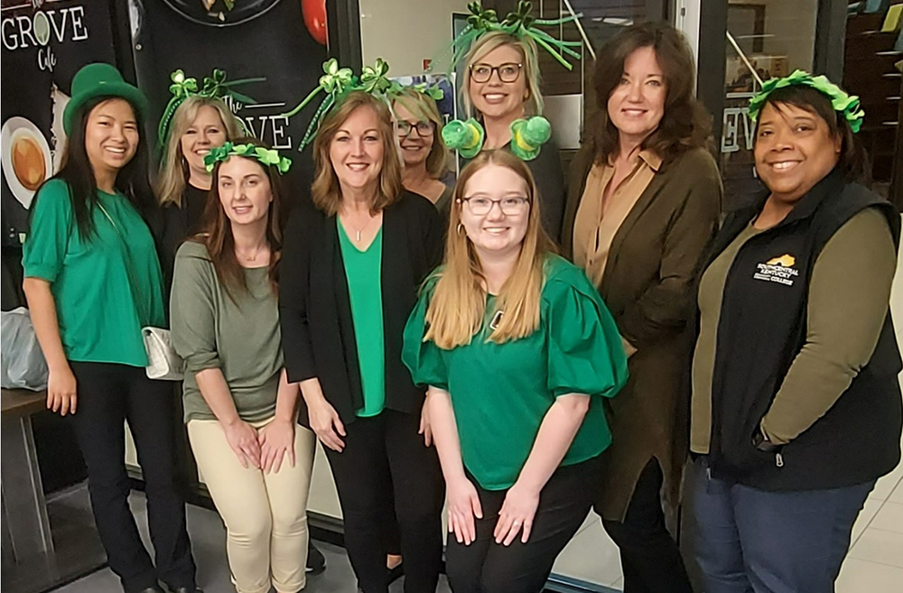 Finacial Aid and Business Office staff dressed in St Patrick's costumes.