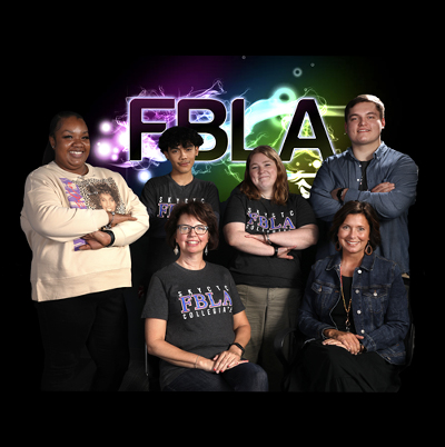 Five FBLA students standing with two sponsors seated and FBLA logo in background
