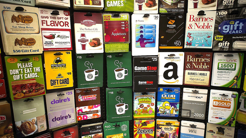 Gift cards hanging on a store rack