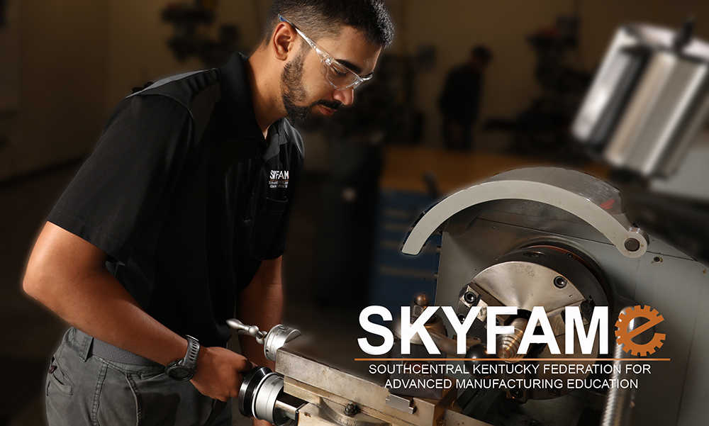 Picture of male working on a milling machine with SKY FAME logo.