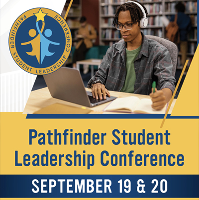 Picture of a young man with headphones on a laptop with words Pathfinder Student Leadership Conference September 19 & 20