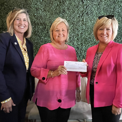 Teresa Lanham with the Robert and Mary Tincher Charitable Foundation presents a check for $100,000 to SKYCTC President, Michelle Trawick, and SKYCTC Foundation Executive Director, Heather Rogers, for student scholarships