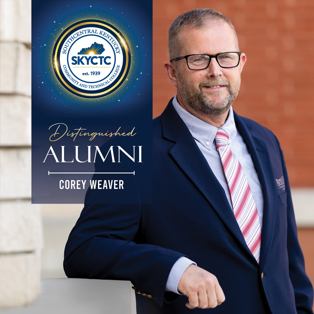 Image of Corey Weaver leaning against a stone wall with Distinguished Alumni Banner