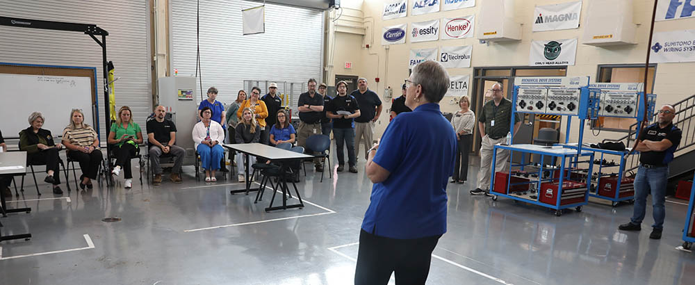 Lady speaking to a group