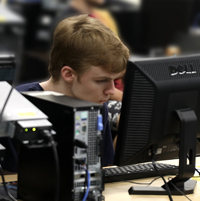 Jackson Blackford working in class on a computer