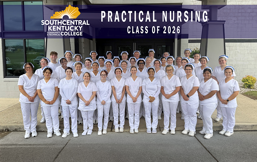 Fourty-two lpn graduates in their uniforms with words class of 2026