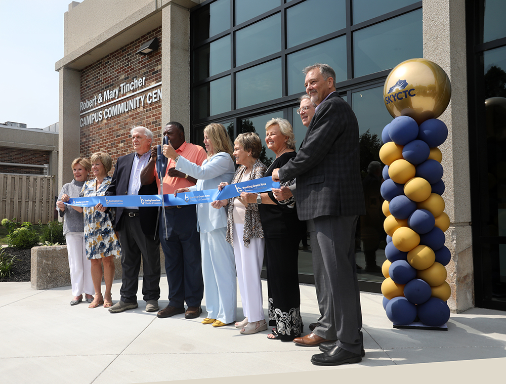 People cutting a ribbon to open the new Tincher Community Center