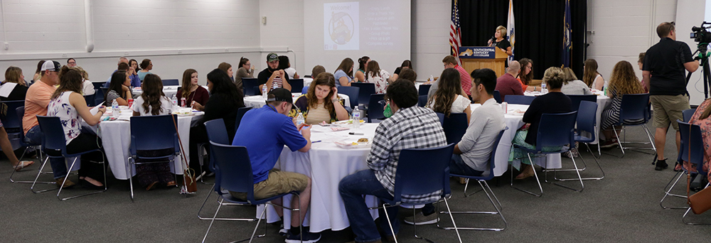 scholarship recipients listening to speaker at scholarship appreciation luncheon