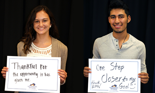 Male and female scholarship recipients holding signs expressing what the scholarship has meant to them