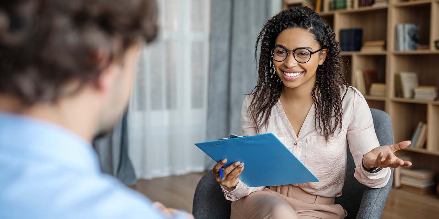 Life coach talking to a client