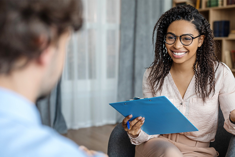 Life coach talking to a client