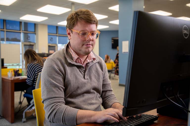 Person taking a test on a computer